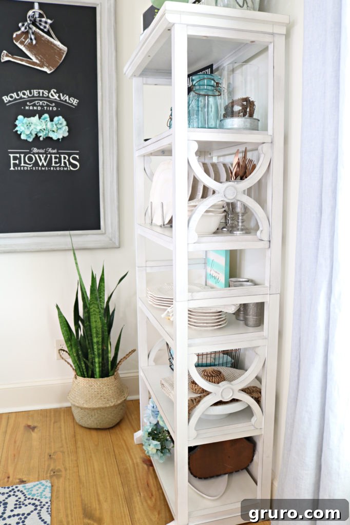 Curated Dining Room Shelving 7 open shelving details, showing a close-up of beautifully arranged items.