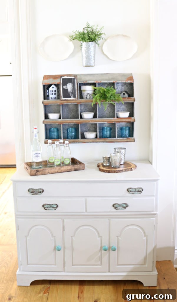 Curated Dining Room Shelving 9 dining room buffet with decor sourced from other areas of the house.