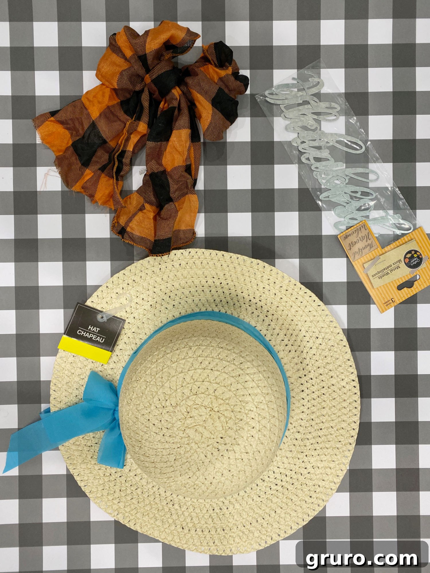 Warm Fall Pumpkin Door Welcome 5 Dollar Tree hat and various craft supplies for fall decor