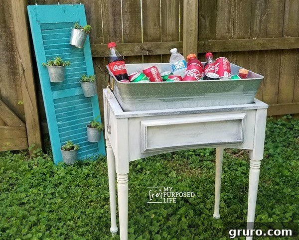 Drink Station made from a repurposed sewing machine cabinet and galvanized tub
