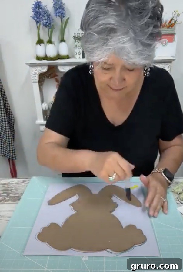 Tracing bunny onto ceiling tile
