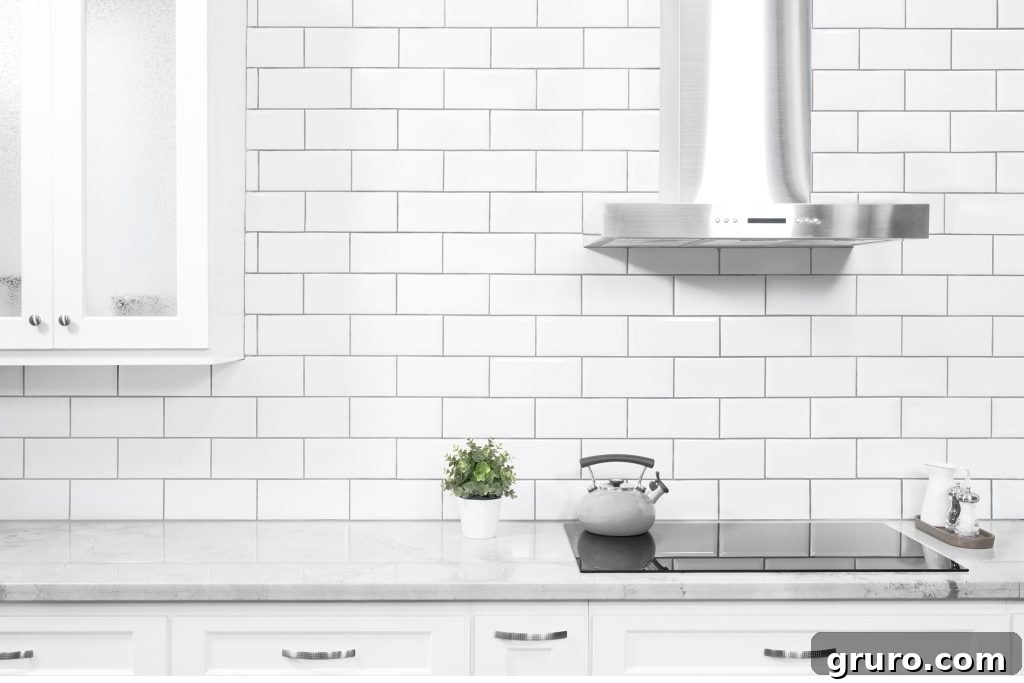 Elevating White Kitchens: 30 Backsplash Inspirations 2 Traditional White Subway Tile White Kitchen Cabinets