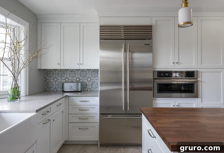 Elevating White Kitchens: 30 Backsplash Inspirations 16 Moroccan Tile Accent Backsplash