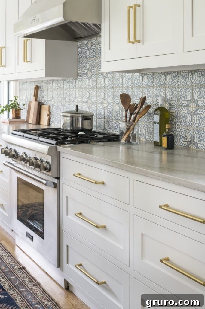 Elevating White Kitchens: 30 Backsplash Inspirations 17 Colorful Moroccan Tile Backsplash with White Cabinets