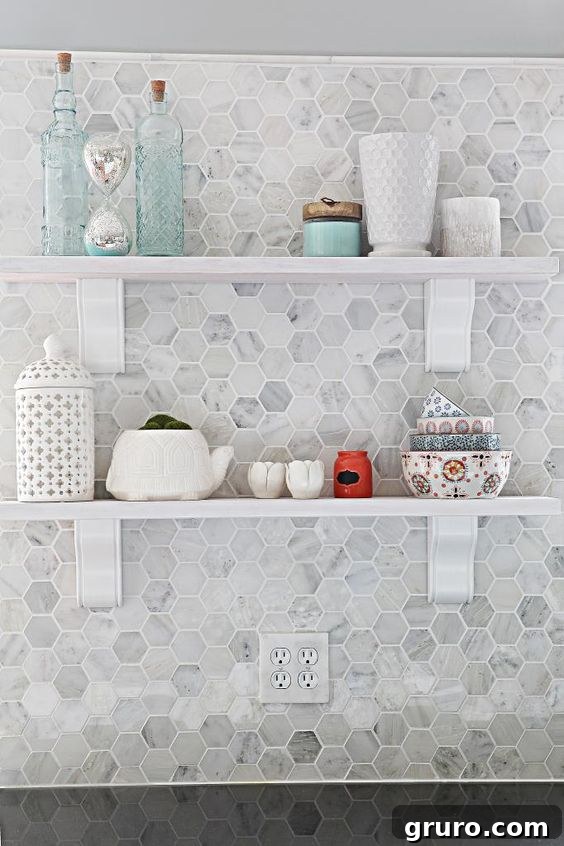 Elevating White Kitchens: 30 Backsplash Inspirations 27 Marble Hexagon Backsplash for White Kitchens