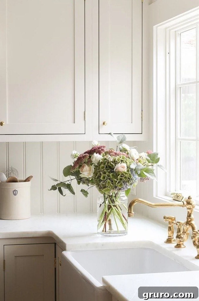 Elevating White Kitchens: 30 Backsplash Inspirations 28 White Beadboard Backsplash with White Cabinets
