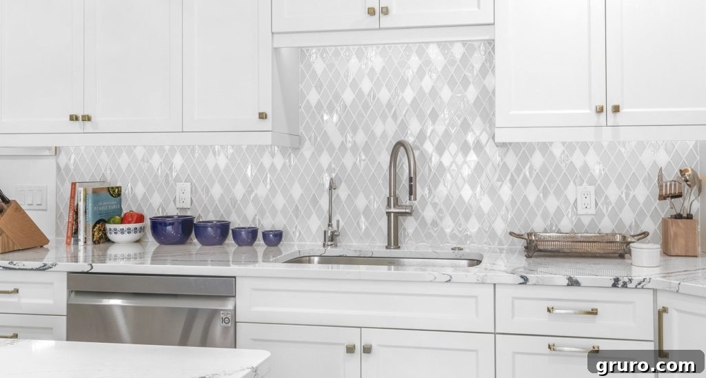 Elevating White Kitchens: 30 Backsplash Inspirations 6 Diamond Pattern Glass Backsplash for White Kitchens
