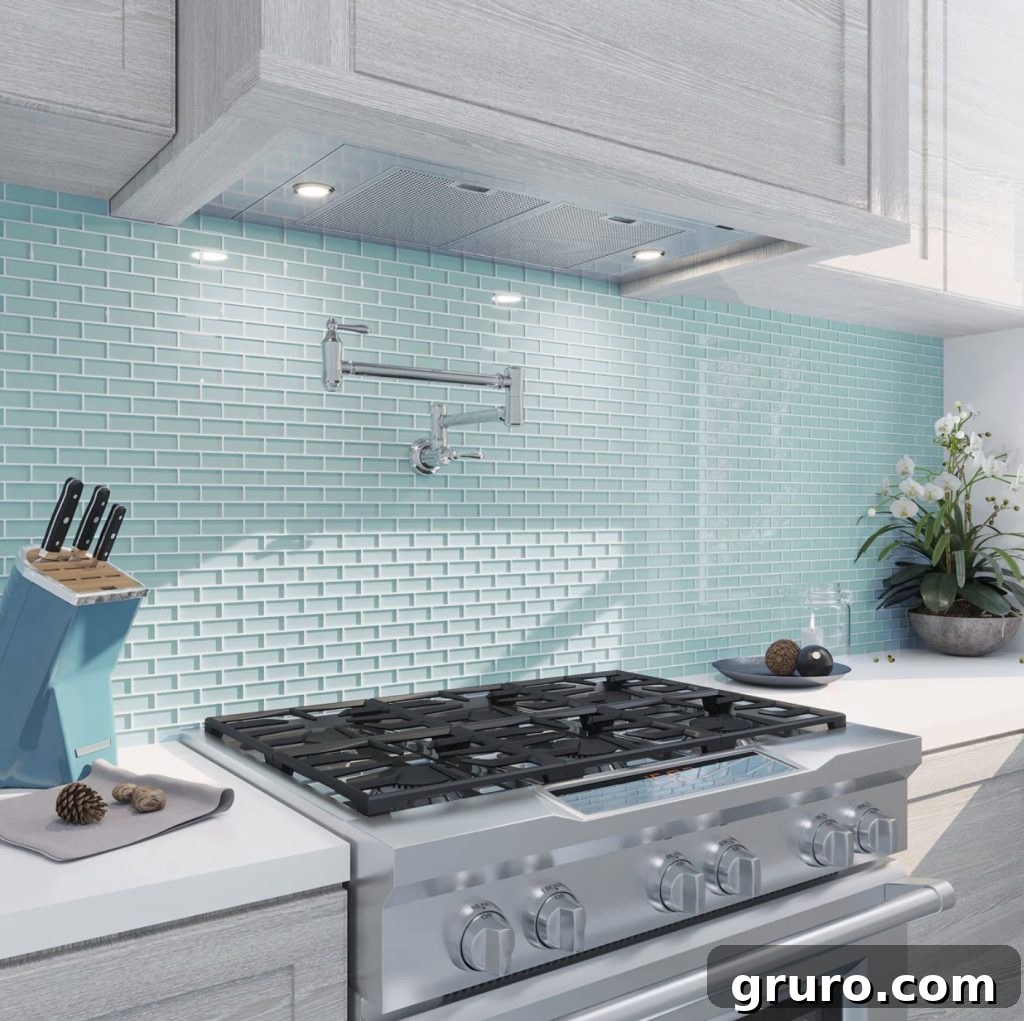 Elevating White Kitchens: 30 Backsplash Inspirations 7 Colorful Blue Glass Backsplash Tile with White Cabinets