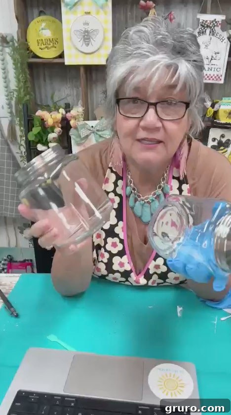 Two plain mason jars, clear glass, before any decoration or painting