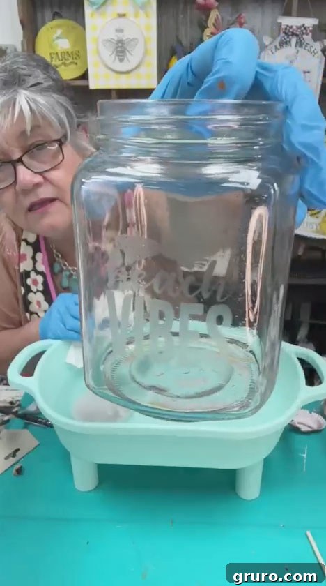 The 'Beach Vibe' design revealed on the mason jar after the glass etching process is complete