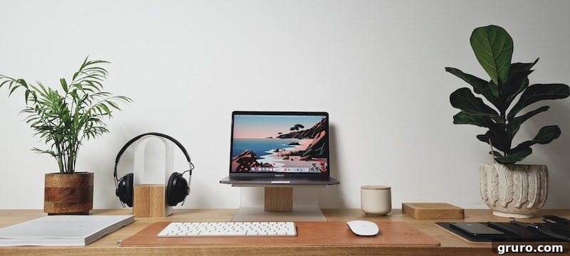 Desk setup with minimalist personal items and tech.