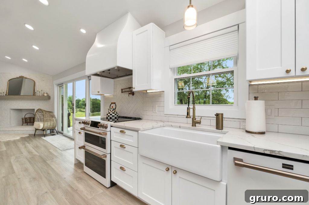 7 Backsplash Ideas to Transform Your White Kitchen 3 Textured glass tile backsplash in a modern white kitchen
