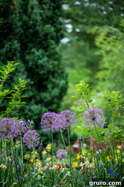 Small Yard, Big Impact: 5 Landscaping Secrets 4 Small garden pathway with mixed pebbles and stepping stones