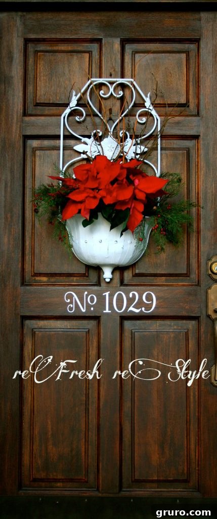 White Planter on Dark Door Finished look: Distressed white metal planter hanging on a dark front door, beautifully enhancing the entryway and curb appeal