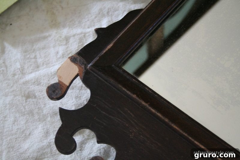 Mirror Makeover Wood Putty Repair Mirror frame with wood putty applied to chipped areas