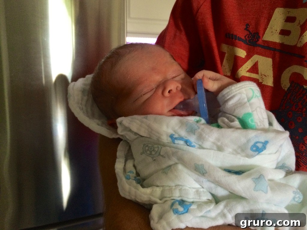 3-Month Progress Update: What Changed and What's Next 15 newborn holding his paci.