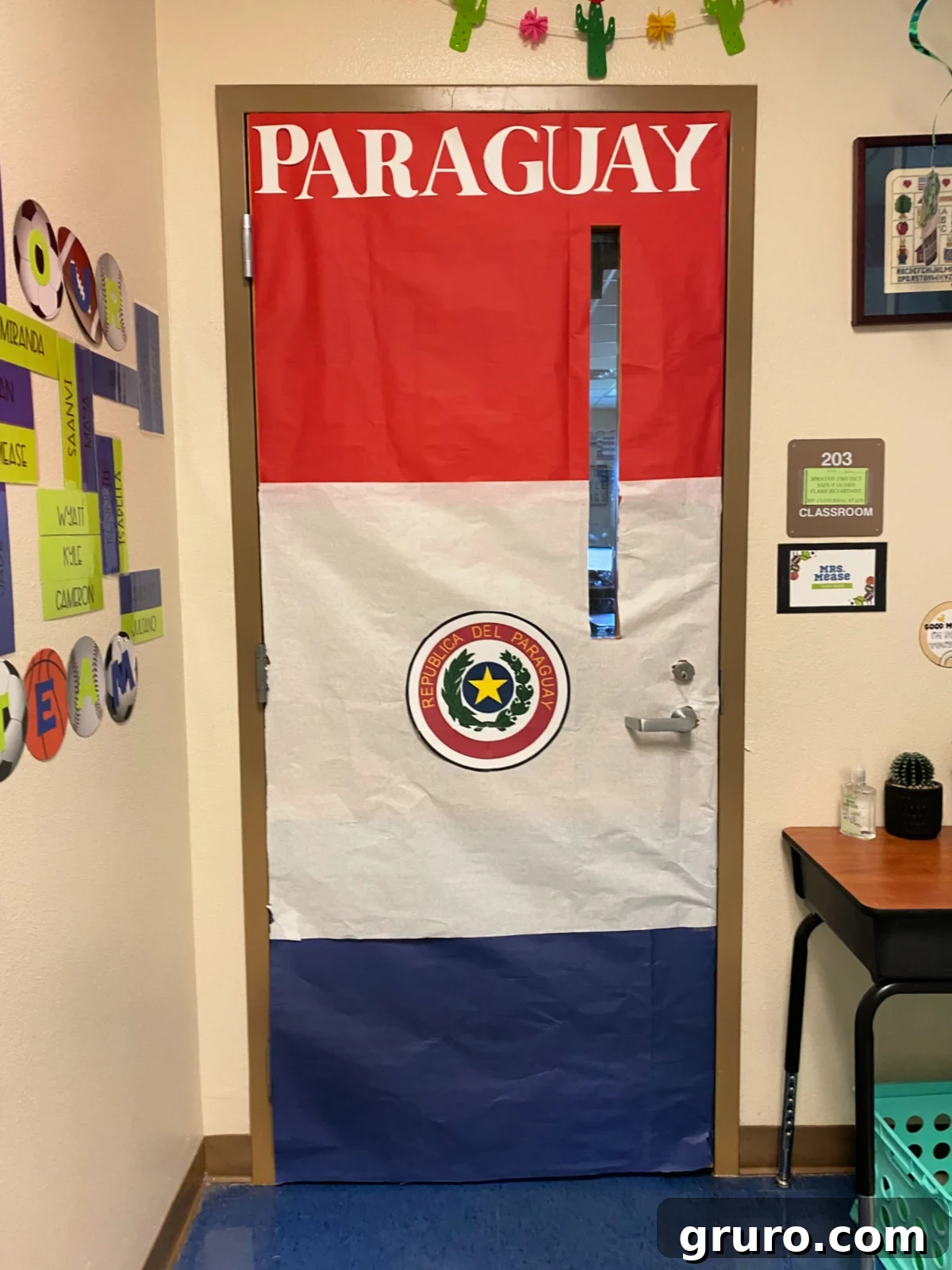 Hispanic Heritage Month Door Decor Ideas 21 Red, white, and blue flag door that says 'Paraguay' with the emblem.